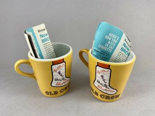 Two Vintage 1960s Yellow Old Crow Kentucky Whiskey Coffee Cup Broken Leg Design