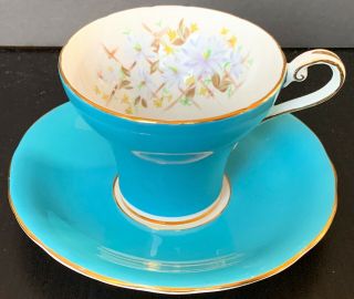 Turquoise Blue Aynsley Corset Shaped Tea Cup And Saucer Set With White Flowers