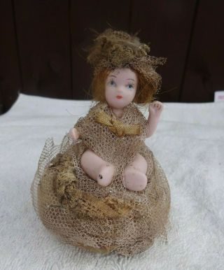 Antique Pin Cushion With A Bisque Lady On Top