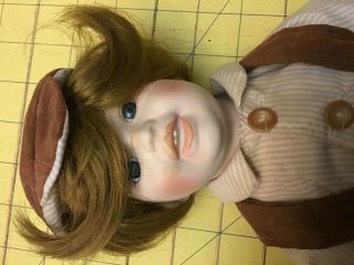 Vintage porcelain/cloth boy doll in velvet dress bibs approximately 45 years old 3