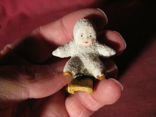 Antique German Bisque Snow Baby On Sled 2