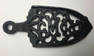 Vintage Antique Cm Co.  Small Ornate Sad Iron Cast Iron Trivet 4 3/8 "