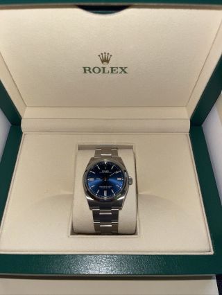 Rolex Oyster Perpetual 126000 Blue Dial Stainless Steel 2021 With Papers Tags