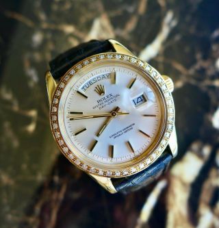 A Vintage 1973 Gents Rolex Day - Date Wristwatch In 18k Gold Ref: 1803