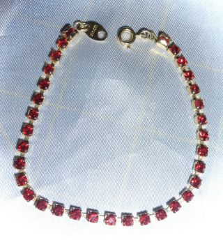 Vintage Avon Tennis Bracelet - Red Rhinestones In Goldtone Setting - 7 1/2 "
