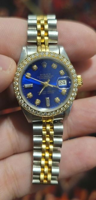 Ladies Rolex Datejust Blue Dial Diamond Bezel 18k Gold Stainless