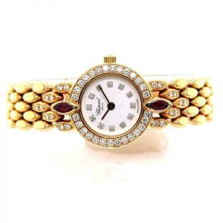 Ladies Contemporary 18k Yellow Gold Diamond And Ruby Wristwatch By Chopard