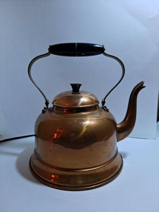 vintage copper tea pot with heart shaped handle made of bronze and wood made in 2