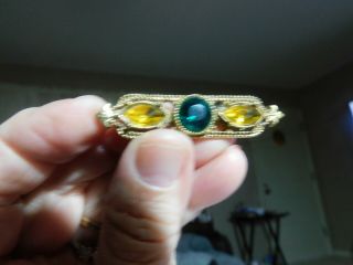 Vintage Art Deco Brooch Pin With Yellow Stones And Green Center Stone