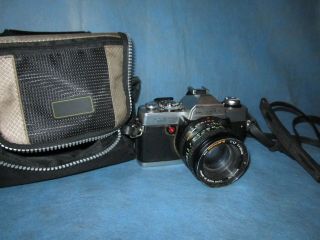 Vintage Minolta Camera With 50mm Lens And Case Xg7