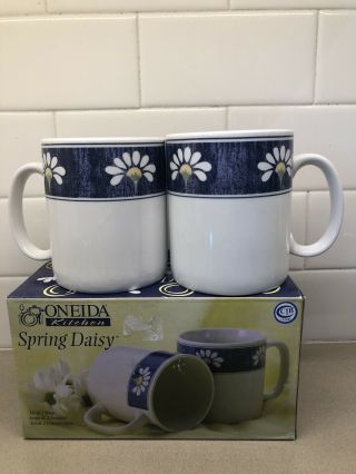 2 Oneida Spring Daisy Coffee Mugs.