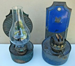Two Vintage Wall Hanging Tin Oil Lamps,  One With Glass Shade.