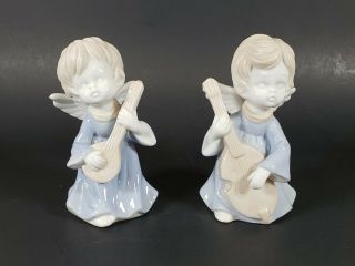 2 Vintage Christmas Angel Boys Violin Mandolin Blue White Porcelain 4 1/2 " Tall