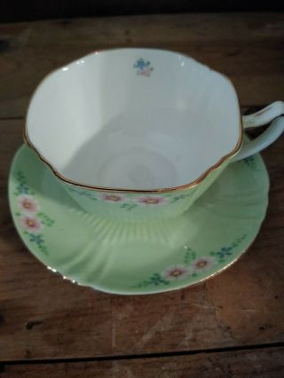 Queen Anne Teacup & Saucer Green W/pink And Yellow Flowers Fine Bone China