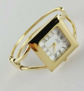 Vintage Ladies Anne Klein Ii Wrist Watch Gold Tone Numeral Hinge Closure