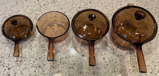 7 Pc Corning Ware Vision Set 2.  5,  1,  1.  5, .  5 L Sauce Pans W/lids Cookware Amber