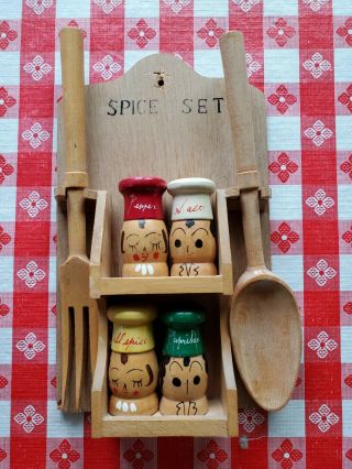 Vintage Salty And Peppy Shakers Spice Shakers Spoon And Fork On Wooden Rack.