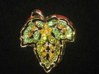 Vintage Gold Tone Leaf Pin With Green And Gold Rhinestones
