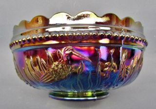 B480 L.  G.  Wright Stork & Rushes Amethyst Carnival Glass Round 4½ " Berry Bowl