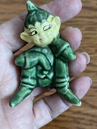 Vintage Green Ceramic Elf Pixie Figurine With Bisque Face Seated 2.  75x2”