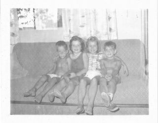 2 vintage photos boys girls kids sitting on couch sofa 2