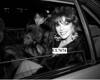 Joan Collins Wearing A Fur Coat In Her Car Photo