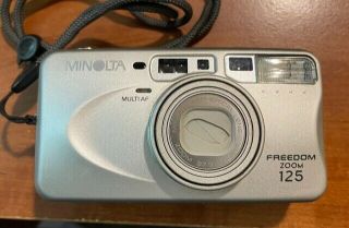 Vintage Minolta Freedom Zoom 125 35mm Camera W/ Roll Of Film And Instructions