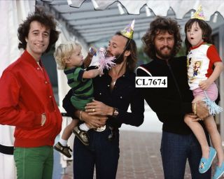 The Bee Gees: Robin,  Maurice And Barry Gibb With Their Choldren At Home In Miami