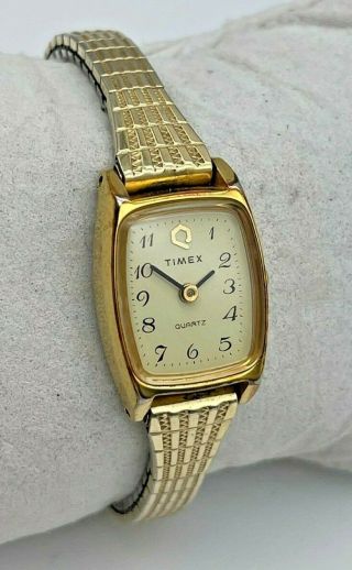 Vintage 1980s Ladies Timex Q Gold Tone Quartz Analog Watch,  Stretch Band,  Runs