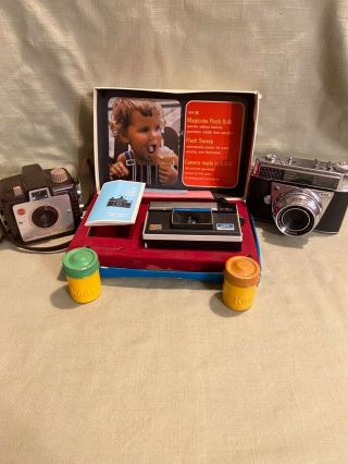 3 Vintage Cameras,  Brownie Holiday Flash,  Magicube,  & Kodak Retina Automatic