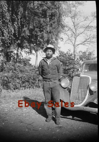 Ab D Vintage Photo Negative - Man Standing In Front Of A Car