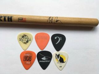 Pearl Jam guitar picks of different tours,  Drum stick 2