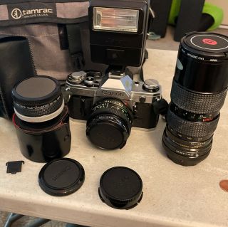 Canon Ae - 1 35mm With 3 Lens And Flash Bundle (film Camera) With Accessories