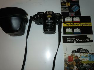 Nikon EM 35mm Camera with 50mm Series E Lens 2
