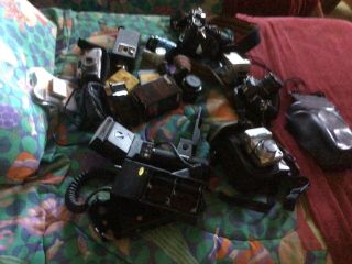 Canon,  Ricoh,  Nikon Cameras,  Film,  Lenses,  Flashes,  (?) Repair,  Parts
