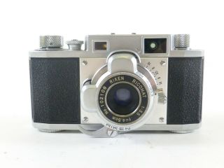 Ricoh 35 Rangefinder Film Camera With A 4.  5cm F/3.  5 Lens, .
