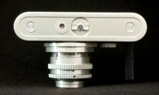 Argus C4 camera body with Cintar 50mm f 3.  5 lens and bulb flash unit 3