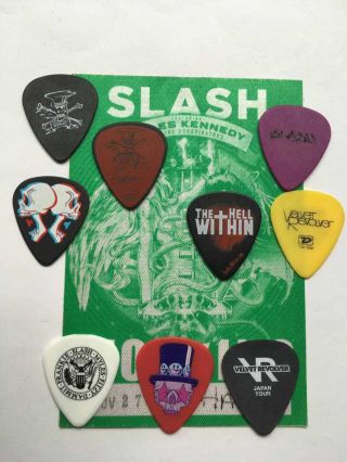 Slash Pack With 9 Guitar Picks Of Different Tours