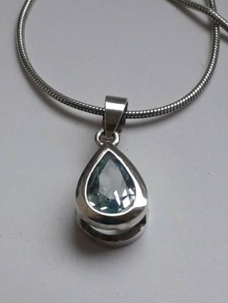 Vintage Sterling Silver Necklace With Teardrop Blue Topaz Pendant.