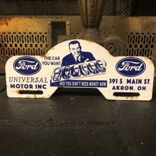 Vintage Ford Universal Motor Inc Metal License Plate Topper Sign