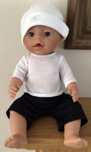 And Brown Eyed Baby Born Boy Doll In Cute 2 Piece Outfit & Hat.