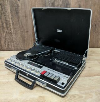 Bohsei 6100 Phonograph,  Am/fm Stereo,  Cassette In Briefcase