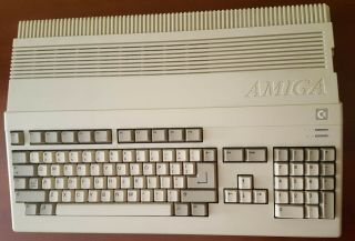 Commodore Amiga 500 With Supra 512k Ram,  Clock,  A520,  23 Game/music Disks,  Mouse