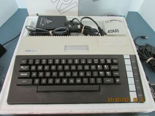 2 Atari 800XL ' s,  1 Power Supply,  3 Switch boxes,  2 Video Cables,  2 Manuals 2