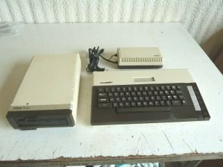 Vintage Atari 800xl Computer/keyboard 8050 Disk Drive & C061982 Power Supply